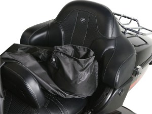 Photo of cover out of carrier, sitting on back seat of motorcycle